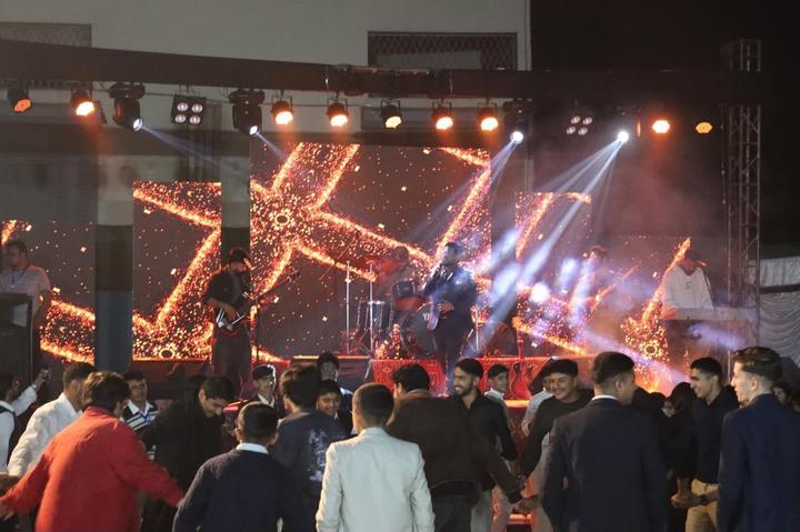 A live band performing at a PT MUN social